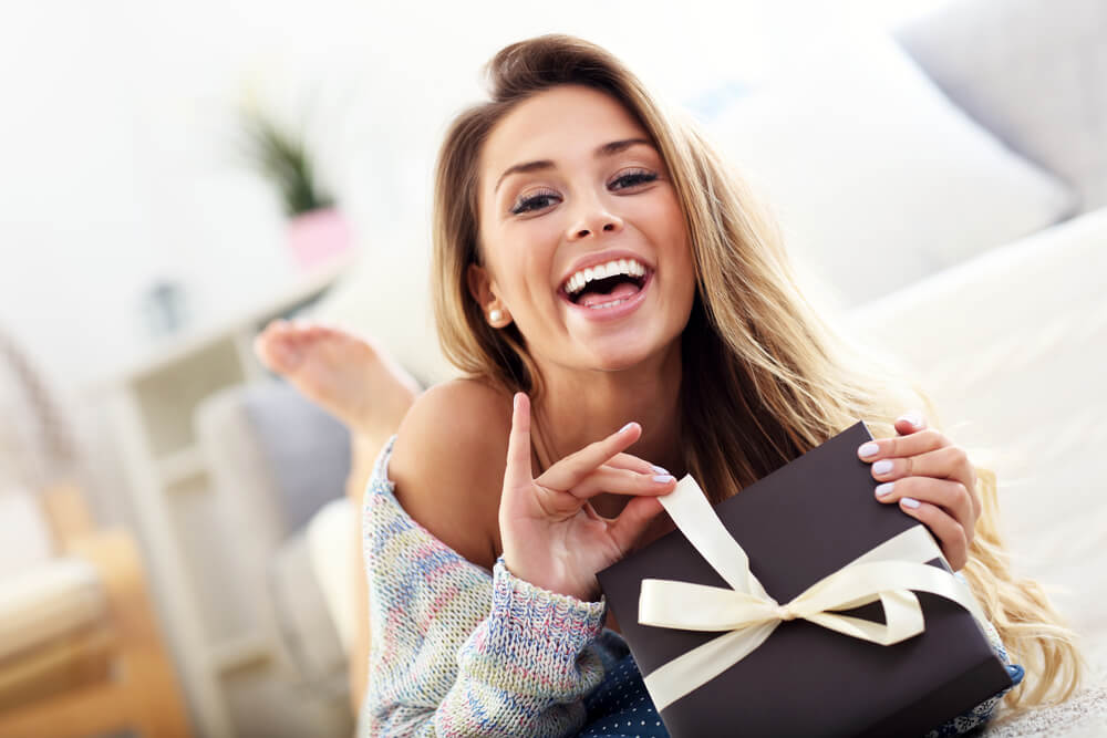 Woman opening present