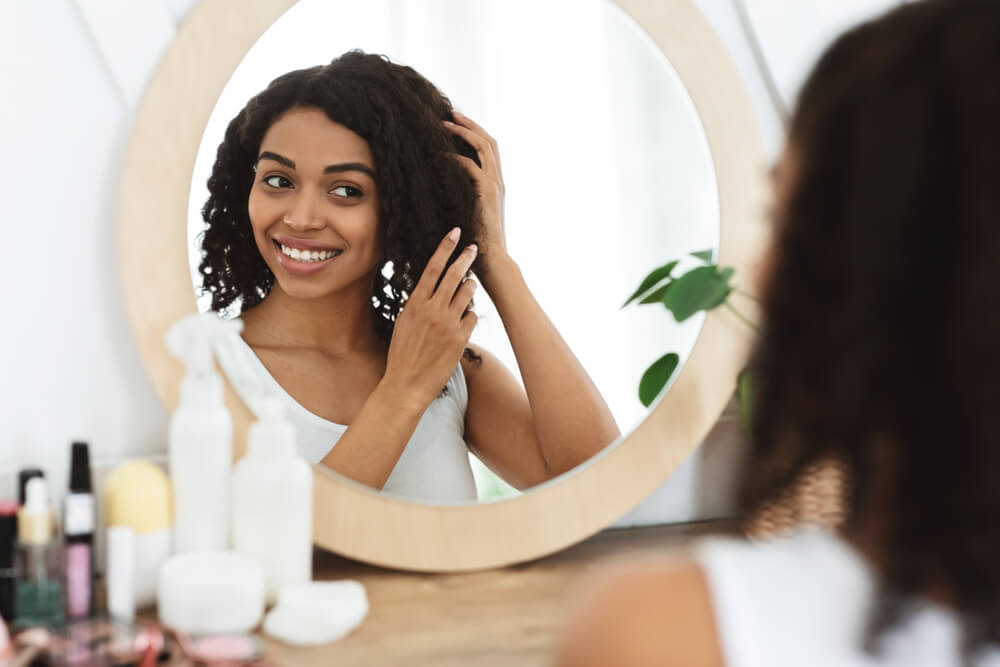 Woman touching hair