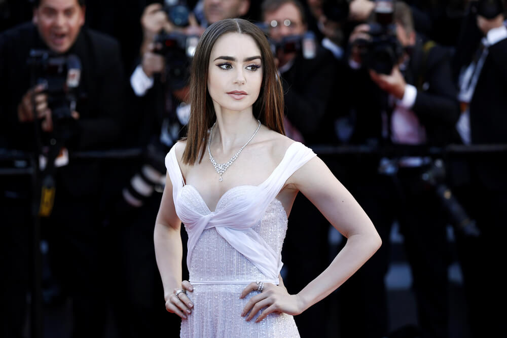 Lily Collins with black eyebrows