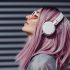 Woman with pink hair and headphones - fun hairstyles