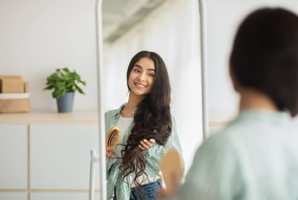 Woman wondering how can you fix dry hair