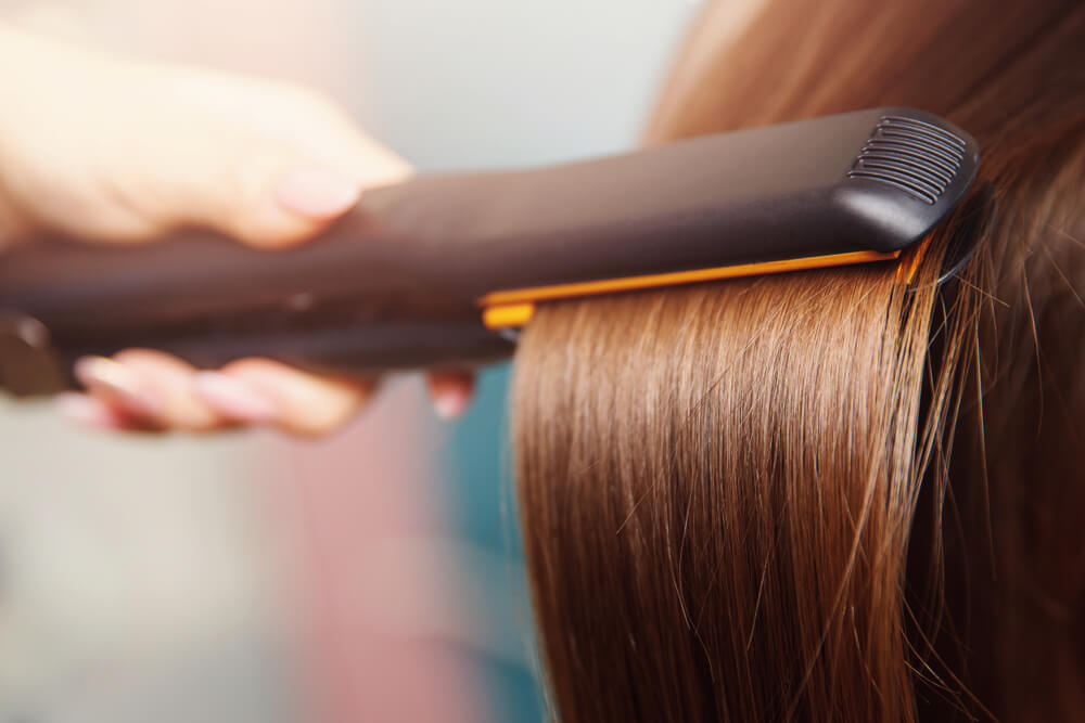 hair being straightened