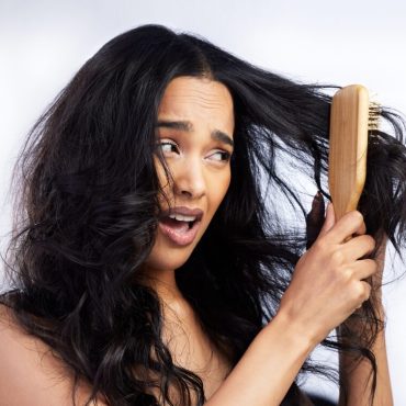 woman brushing hair
