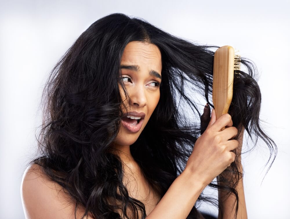 woman brushing hair