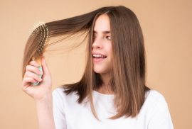 woman brushing hair