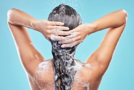 woman shampooing hair